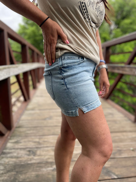 Risen light wash denim shorts