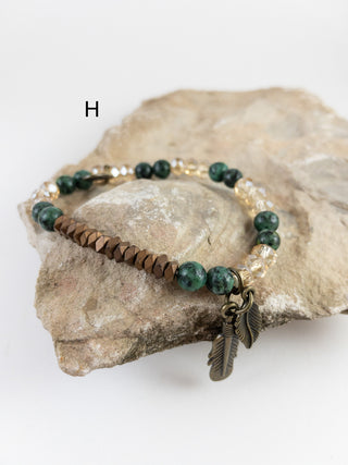 Bracelets $12-Jewelry-Teal feathers-It&#x27;s Personal Boutique LLC